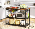 Stckjxx Kitchen Island With Industrial Island Table With Power Outlets And Wire Baskets 3 Tier Microwave Oven Stand Butcher Block Island With Large Worktop 4 Hooks Rustic Brown