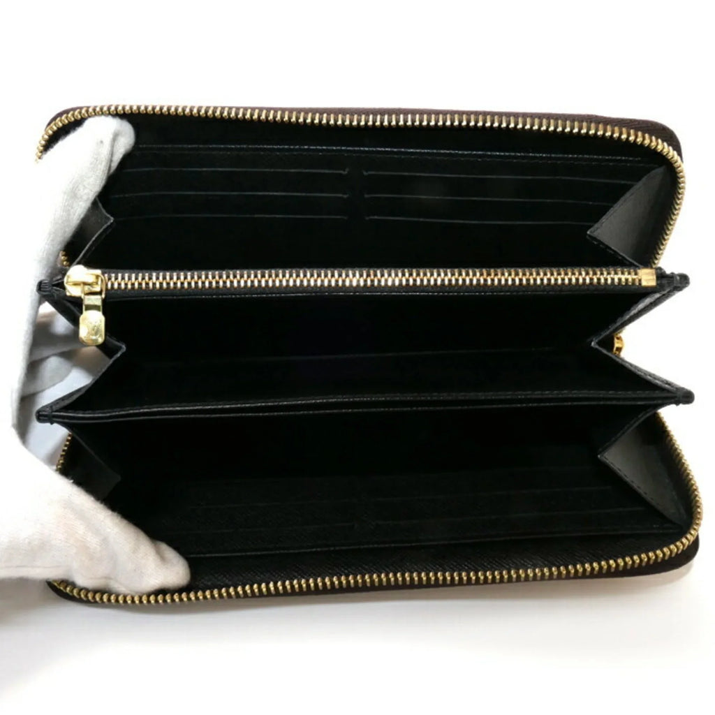 Pre-Loved Louis Vuitton Monogram Giant Long Wallet Round Zipper Zippy M69353 Unisex (Good)
