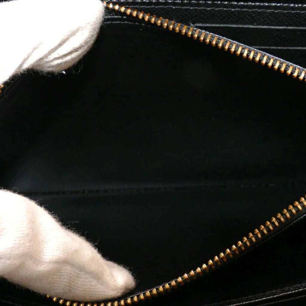 Pre-Loved Louis Vuitton Monogram Giant Long Wallet Round Zipper Zippy M69353 Unisex (Good)