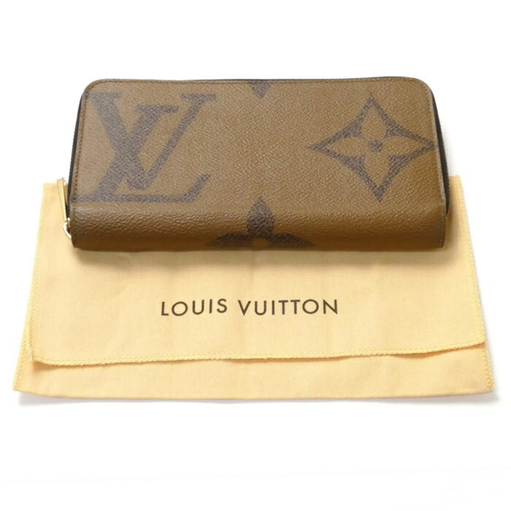 Pre-Loved Louis Vuitton Monogram Giant Long Wallet Round Zipper Zippy M69353 Unisex (Good)